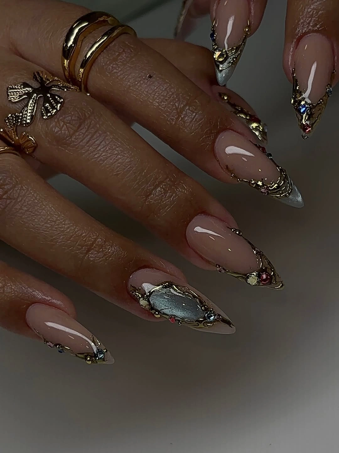 trendy almond nails 2027 - Metallic Ornamental Almond Nails With Crystal Details