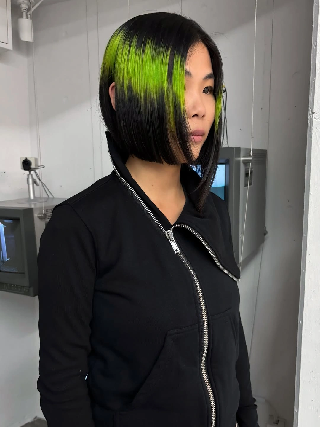 trendy winter hair colors Electric Black and Acid Green Bob