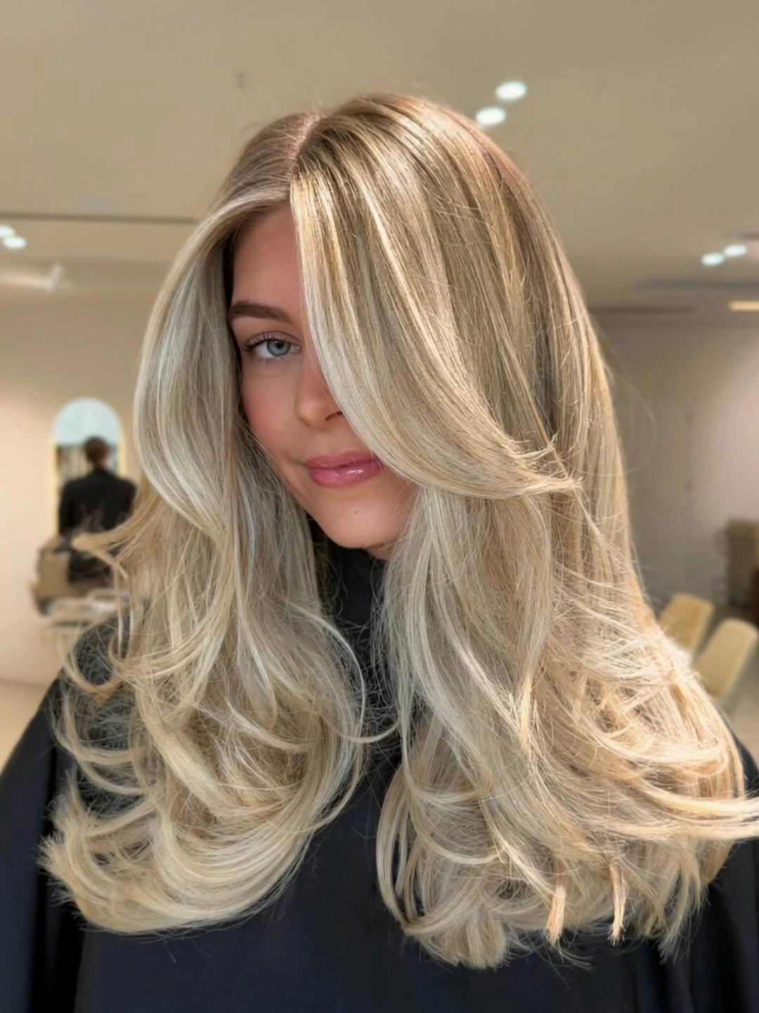 trendy winter hair colors Champagne Blonde With Soft Winter Shine