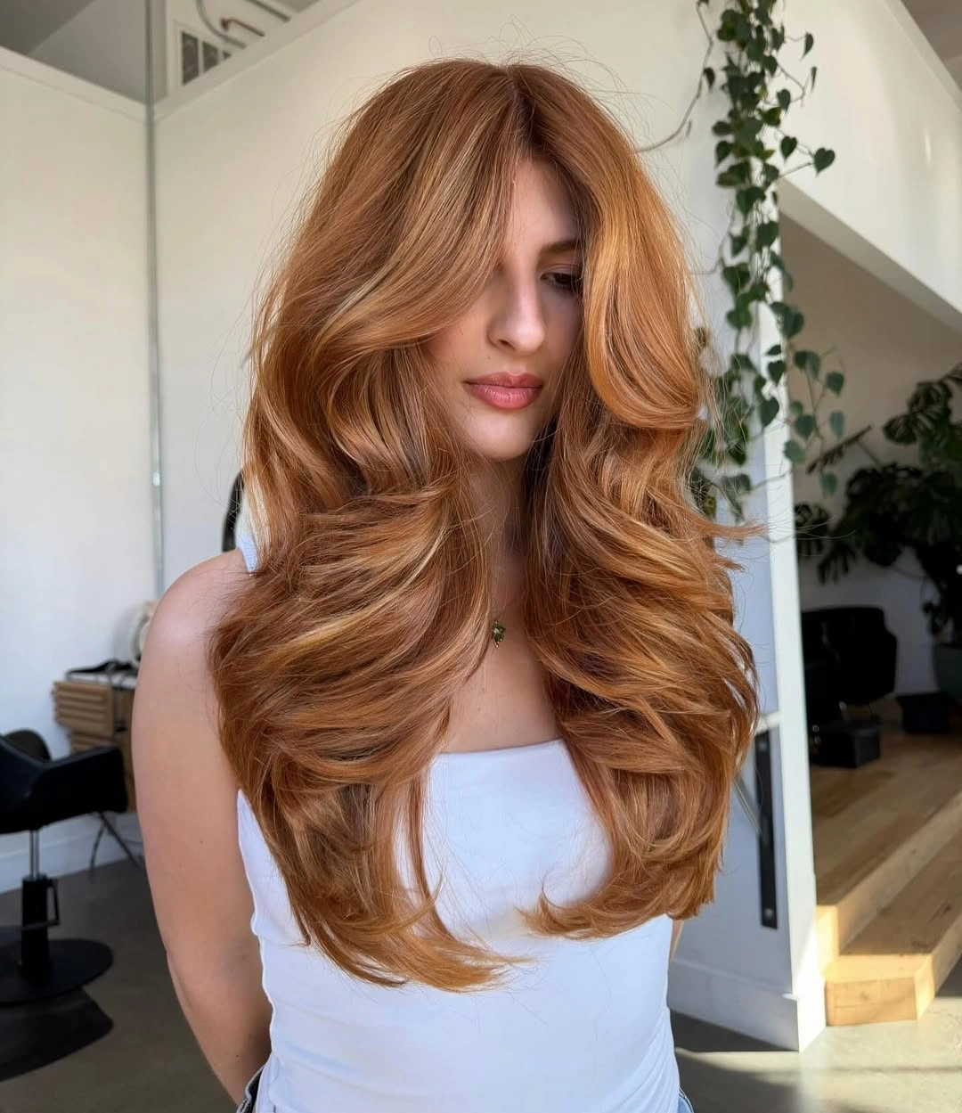 trendy winter hair colors Soft Copper Layers for a Cozy Winter Glow