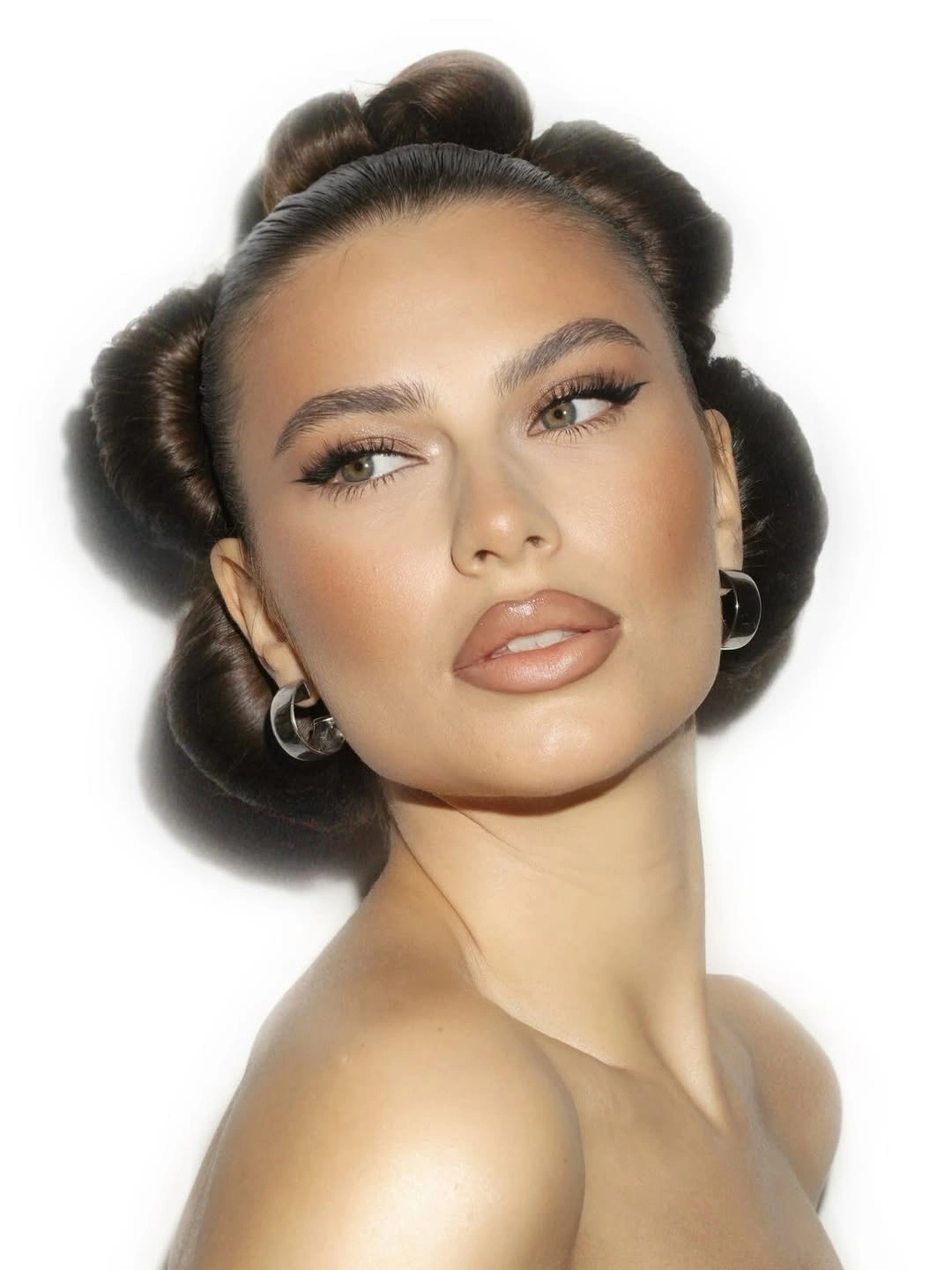 up hairstyle for every occasion Statement Knot Updo With Sculpted Mini Buns