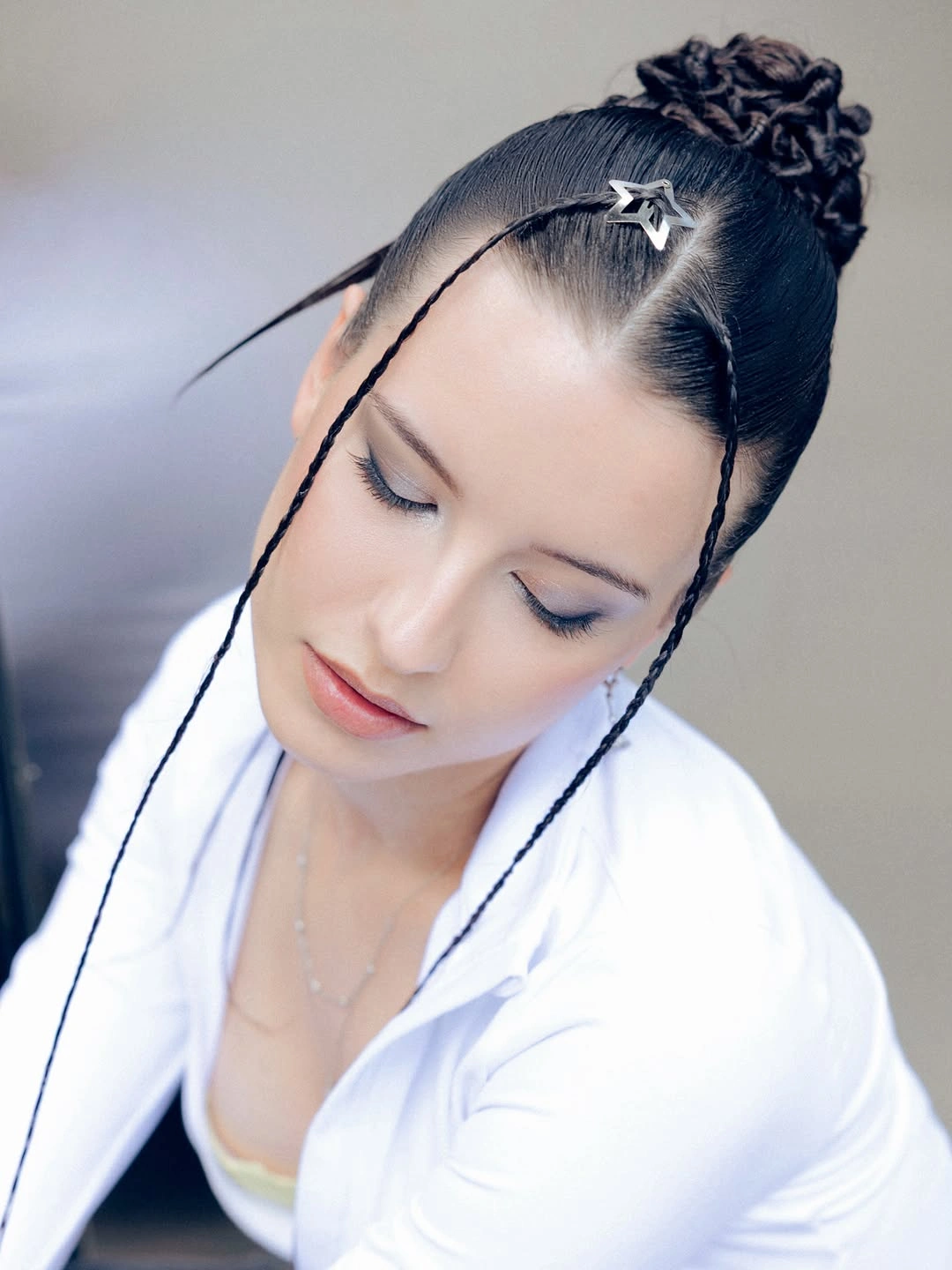 up hairstyle for every occasion Braided Bun With Delicate Face-Framing Details