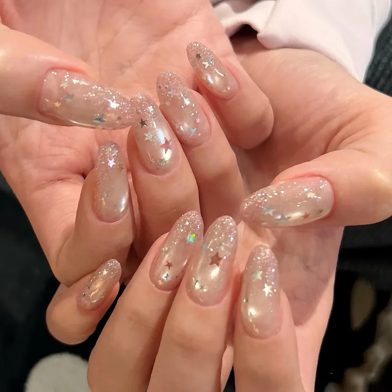 Iridescent Star Glitter Oval Nails Iridescent Star Glitter Oval Nails β Winter Glitter Nails