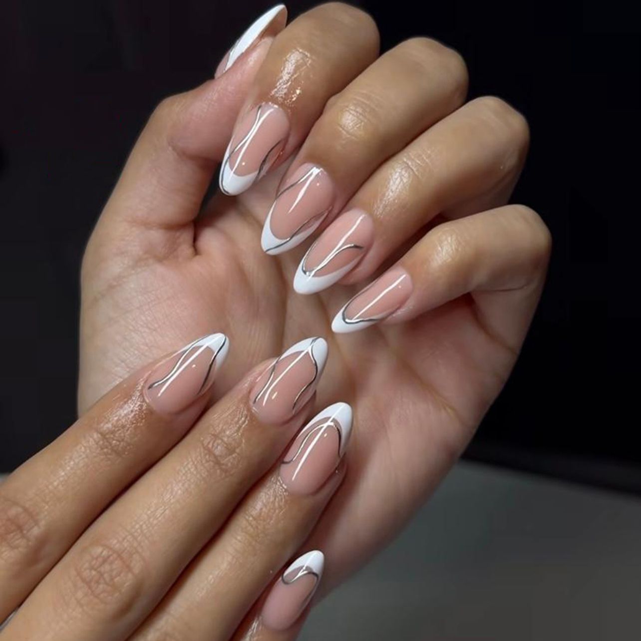 Abstract Silver Lines on White French Almonds Abstract Silver Lines on White French Almonds β New Years French Tip Nails 2027
