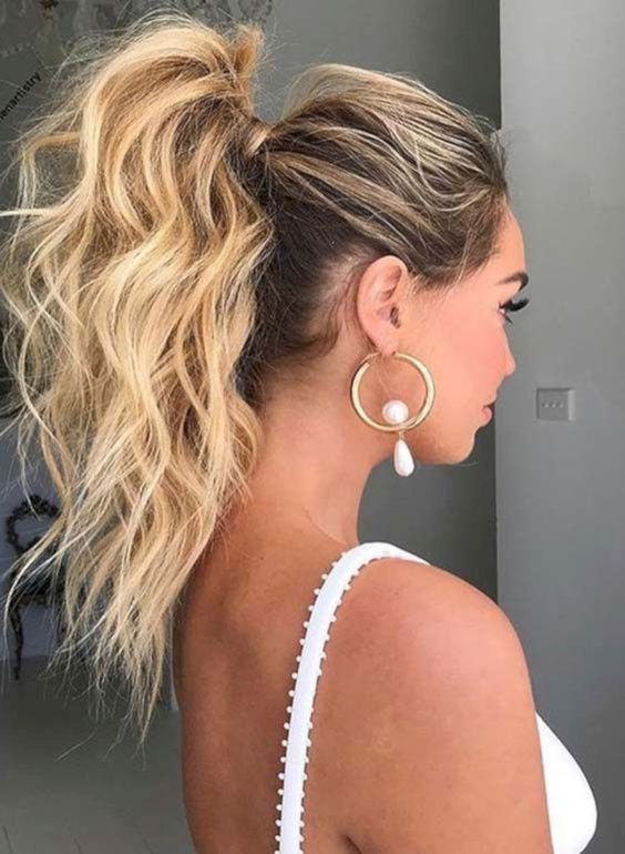 Voluminous High Ponytail With Bangs — Winter Ponytail Hairstyles