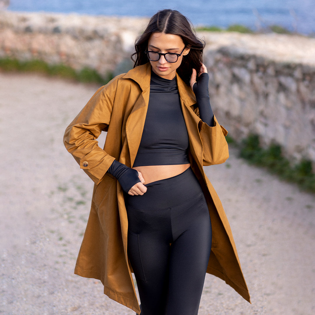 Chic Layering: Trench Coat Over Cropped Top with Leggings Chic Layering: Trench Coat Over Cropped Top with Leggings โ Sweatpants Outfits