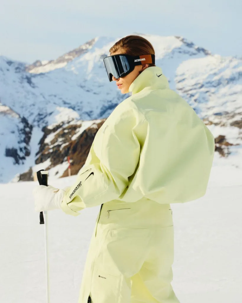 Striped Ski Jacket and Faux Fur Hat for Mountain Apres Ski — Apres Ski Outfits