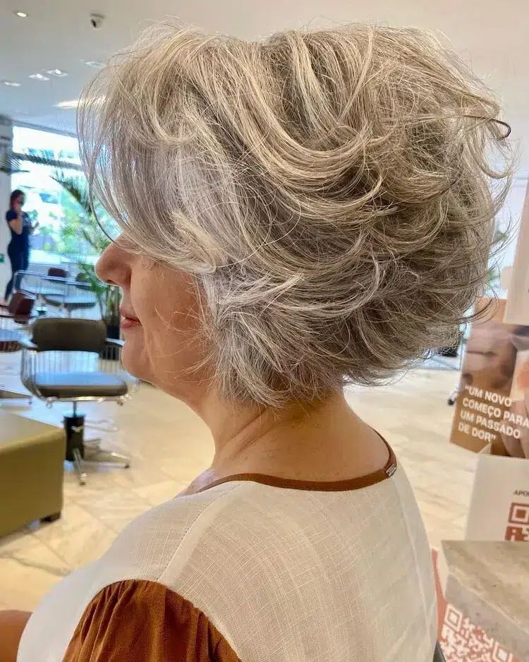 Voluminous Silver Grey Curly Bob — Winter Hair Colors for Women Over 70