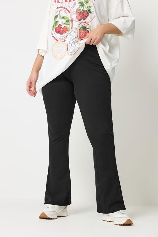 Graphic Comfort: Black Flare Leggings with Oversized Tee — Flare Leggings Outfits