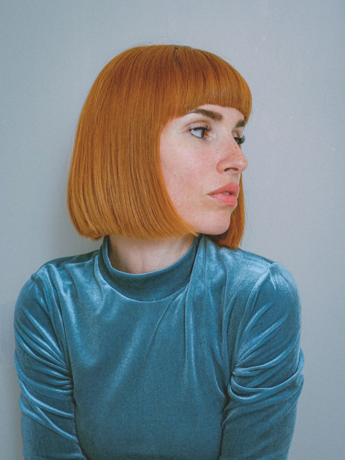 Blunt Copper Bob with Blunt Bangs — Winter Haircuts for Square Faces
