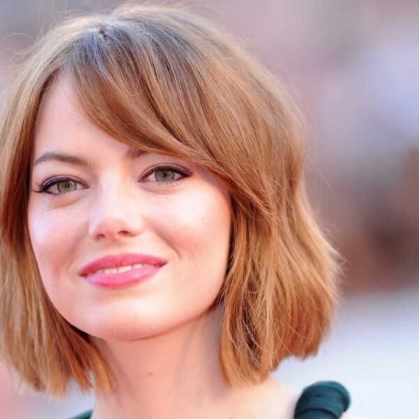 Textured Copper Bob With Side Swept Bangs — Winter Haircuts for Round Faces