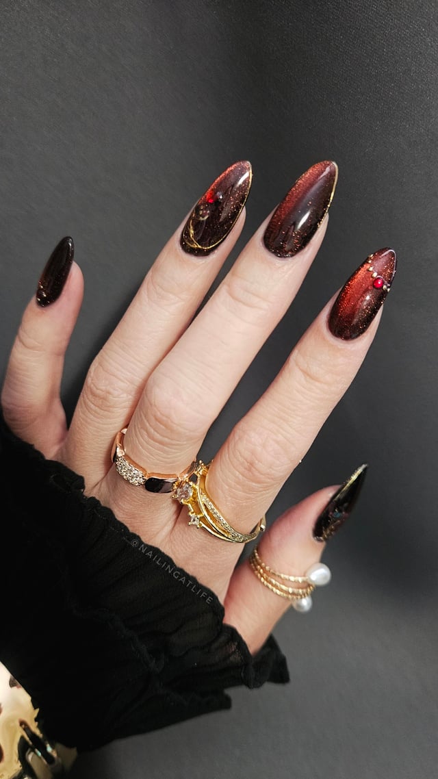 Red Black Gold Shift Cat Eye Embellished Red Black Gold Shift Cat Eye Embellished โ Winter Cat Eye Nails