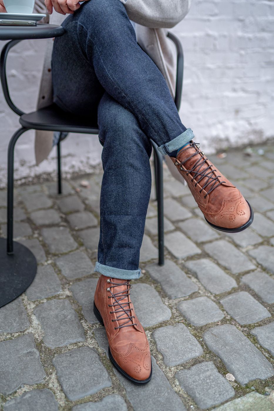 Brown Lace-Up Brogue Boots with Jeans and a Grey Coat — Brown Boots Outfits