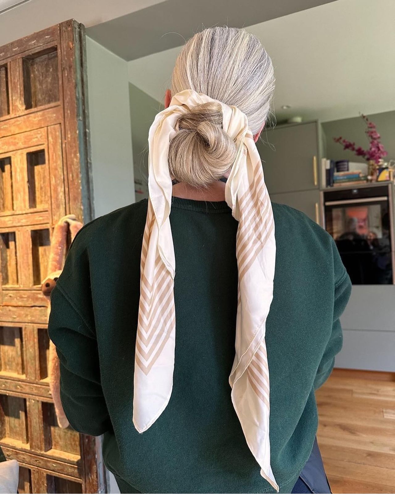 Low Bun with Scarf Accent — Winter Hairstyles with Scarf