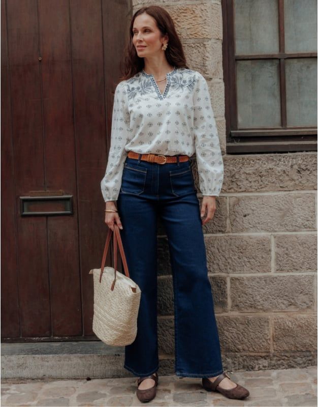 Bohemian Charm: Dark Blue Jeans with Embroidered Blouse — Flare Leggings Outfits