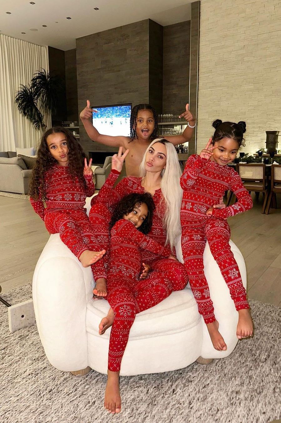 Coordinated Red and White Pajamas for a Festive Holiday Photo — Winter Family Photo Outfits