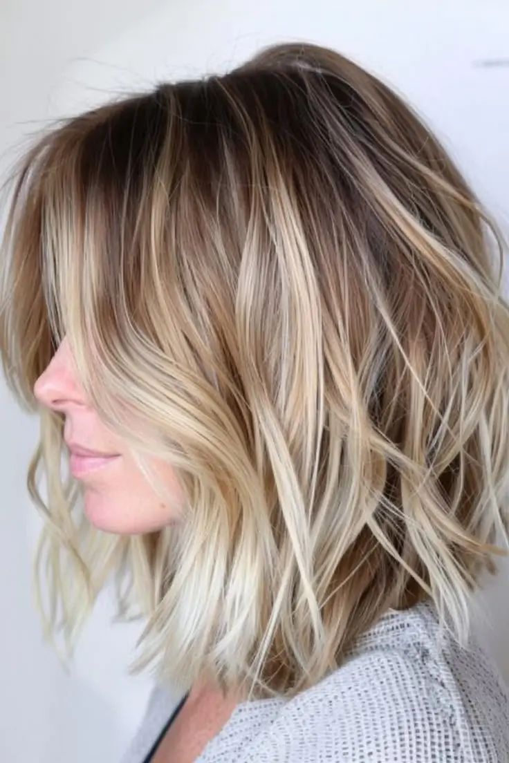 Honey Blonde Shag With Wispy Bangs Honey Blonde Shag With Wispy Bangs β Medium Length Winter Haircuts