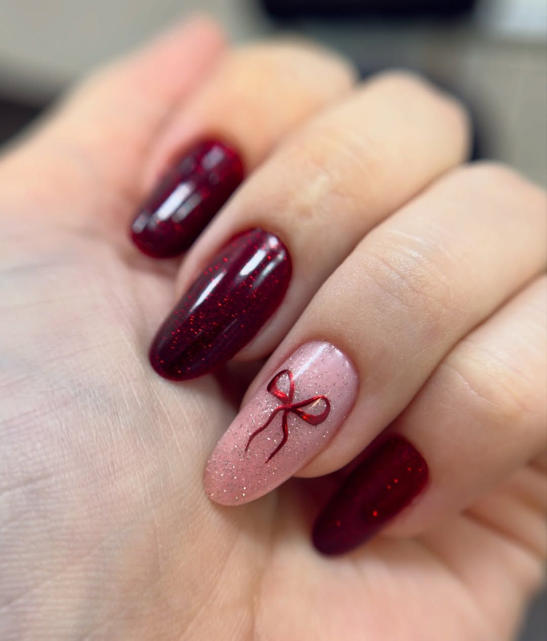 Detailed Red Bow on Glitter Accent Nail Detailed Red Bow on Glitter Accent Nail β Winter Bow Nails