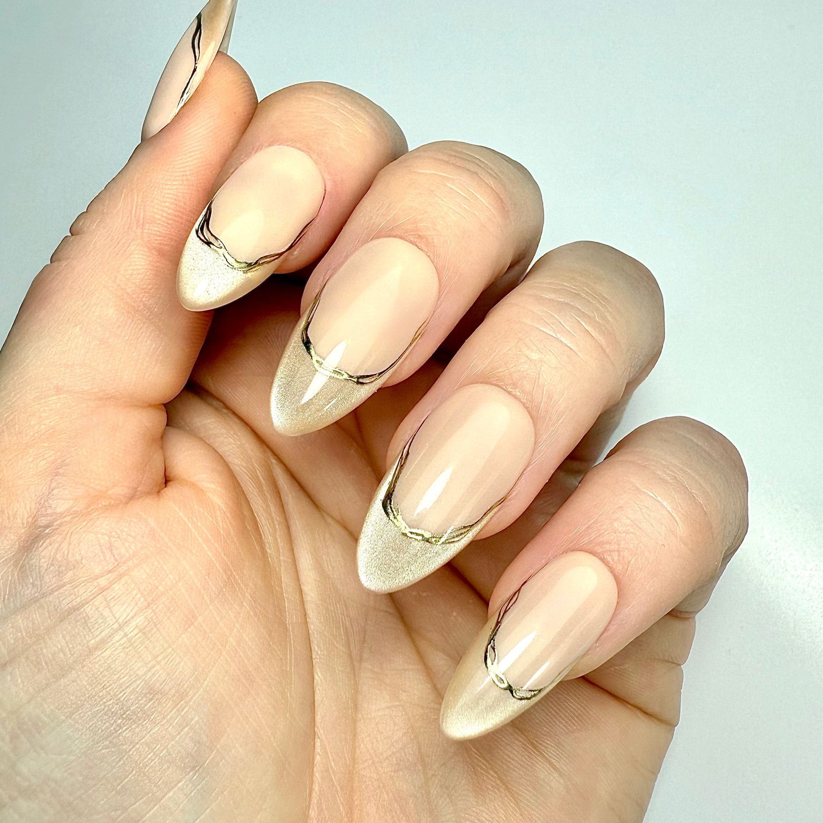 Champagne Cat-Eye French With Gold Foil Champagne Cat-Eye French With Gold Foil β Winter Champagne Nails