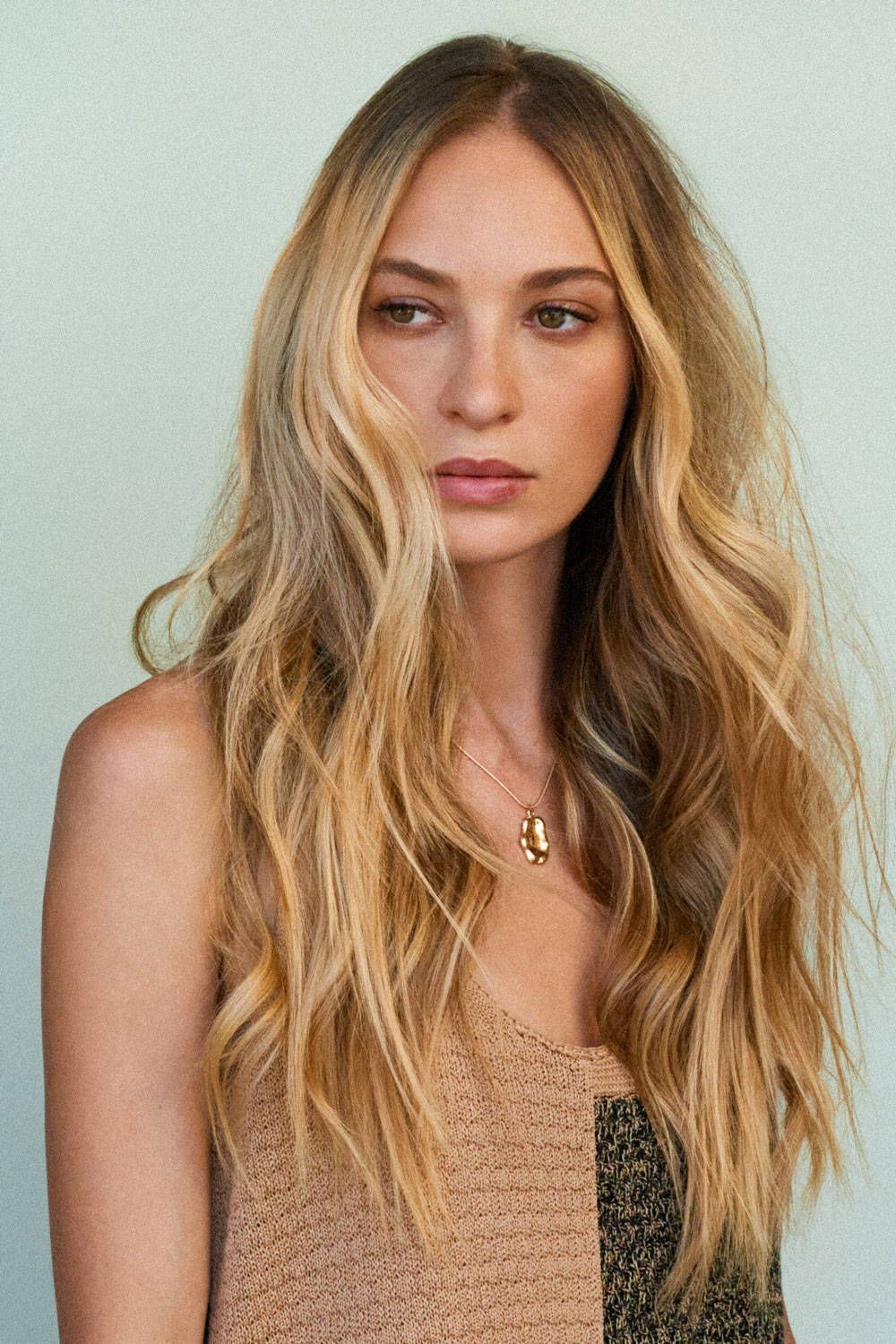 Mid-Back Cool Ash Blonde With Root Shadow Mid-Back Cool Ash Blonde With Root Shadow β Winter Hair Colors for Plus Size Women