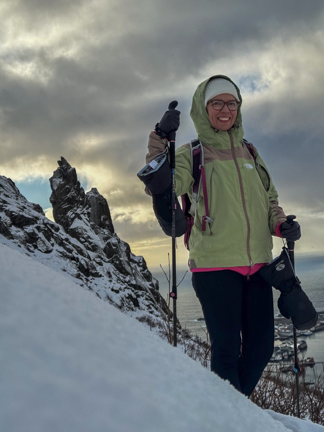 Light Green Jacket with Vibrant Pink Layer for Snowy Trails — Winter Hiking Outfits