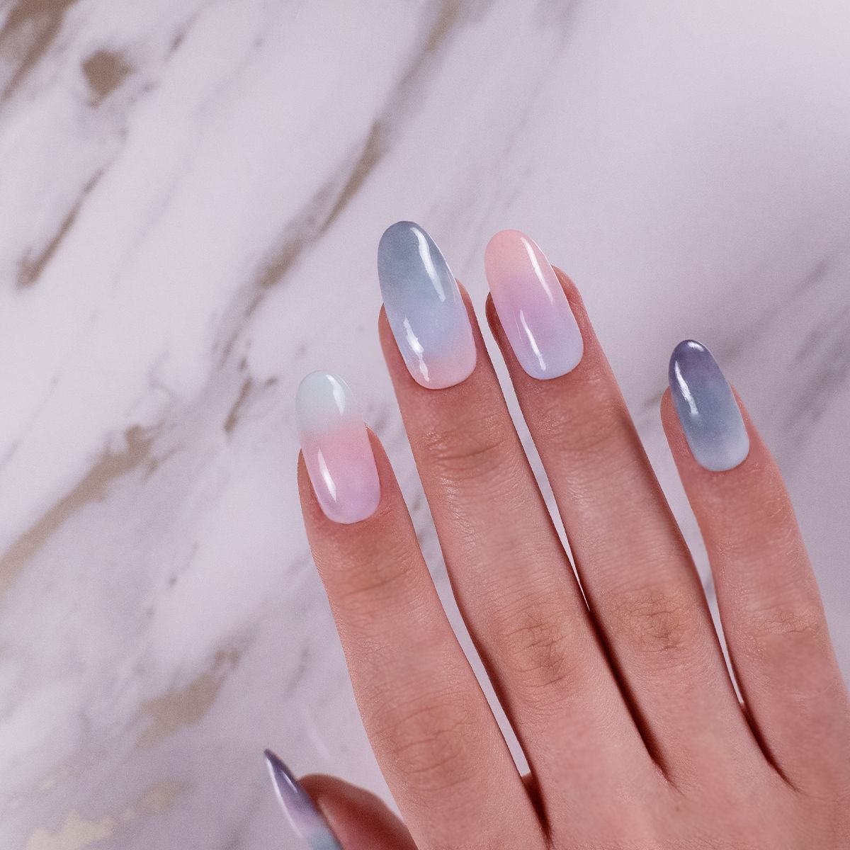 Pastel Pink to Baby Blue Oval Gradient Pastel Pink to Baby Blue Oval Gradient β Winter to Spring Transition Nails
