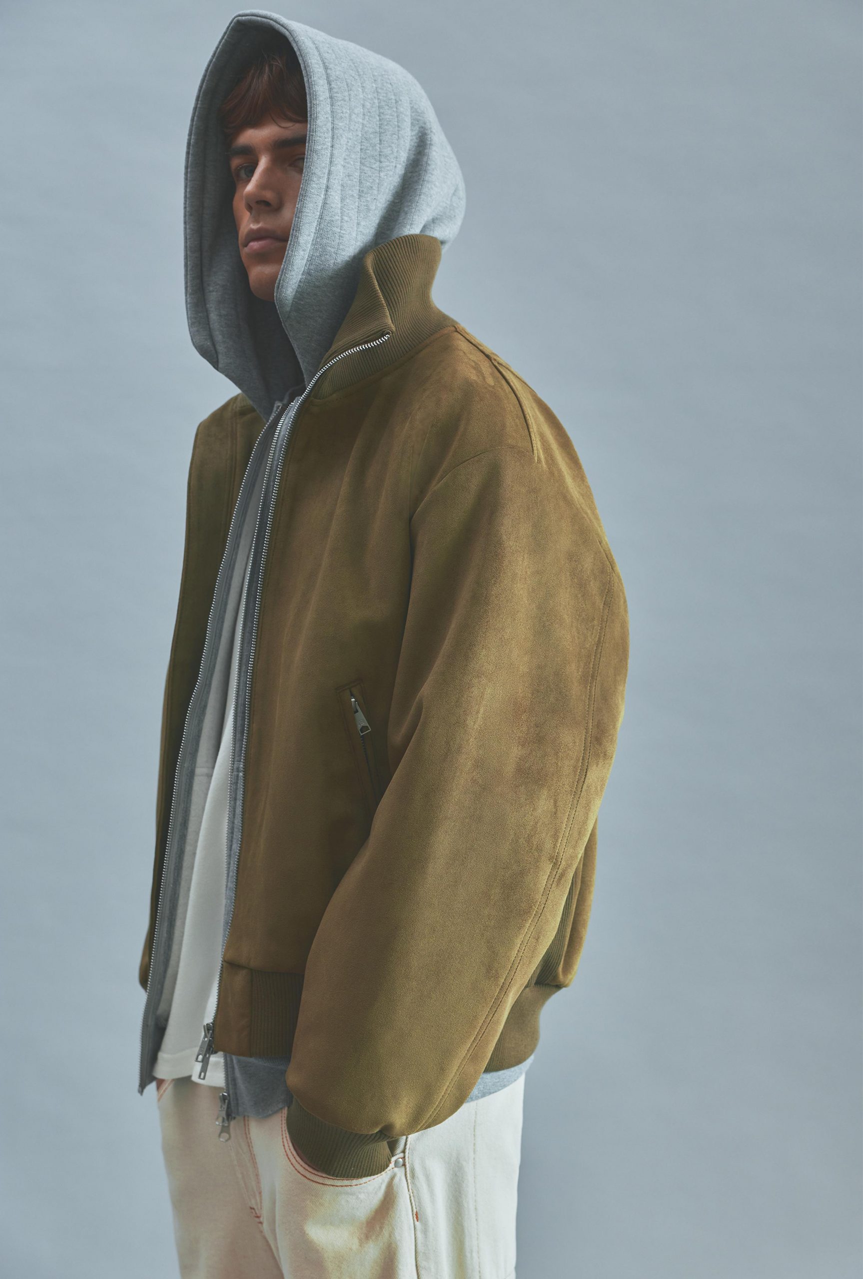 Suede Bomber Jacket Over Hoodie for Textured Casual Style Suede Bomber Jacket Over Hoodie for Textured Casual Style β Winter Outfits for Men