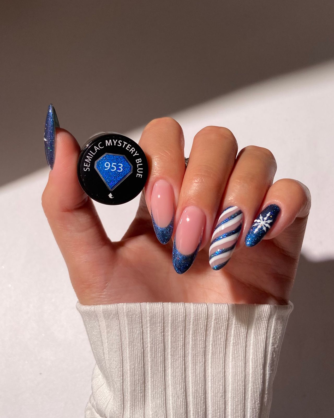 Deep Blue Glitter Snowflake Stilettos Deep Blue Glitter Snowflake Stilettos β Christmas Nail Trends 2026