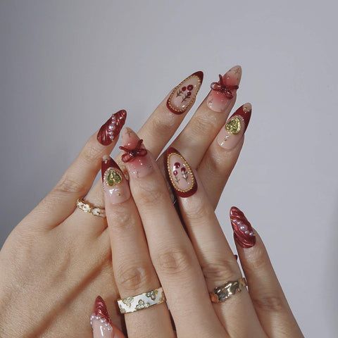 Deep Red Pink Gold 3D Bow Stiletto Nails Deep Red Pink Gold 3D Bow Stiletto Nails β Holiday Party Nails 2026