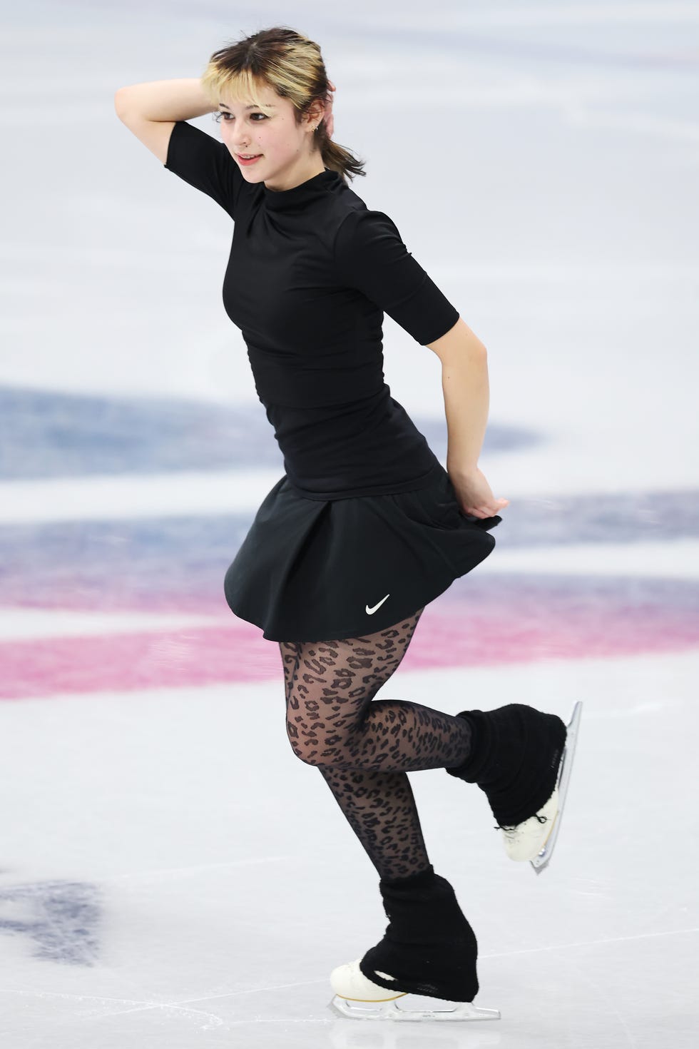 Leopard Print Tights with Mock-Neck Top and Pleated Skirt Leopard Print Tights with Mock-Neck Top and Pleated Skirt β Ice Skating Outfits