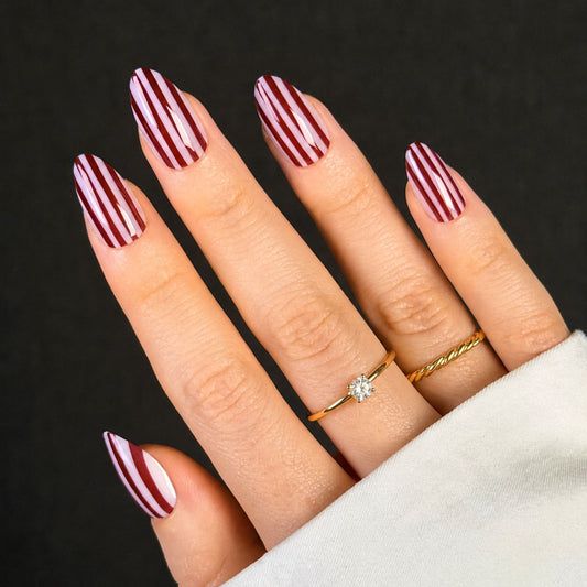 Thin Stripes On All Nails Visual Idea Thin Stripes On All Nails Visual Idea β Medium Winter Almond Nails