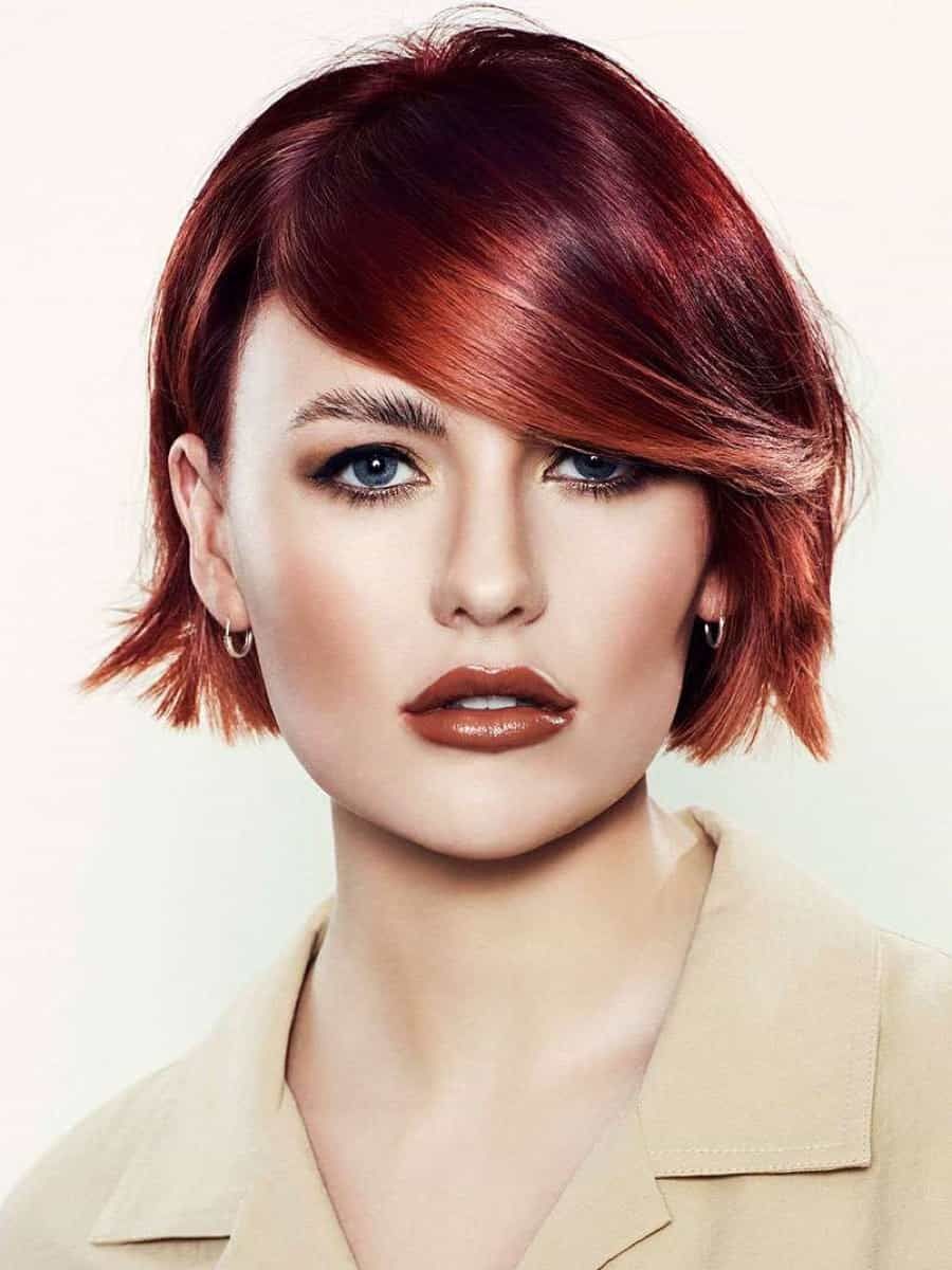 Mahogany With Subtle Red Undertones Sleek Mahogany Bob With Side-Swept Bangs — Mahogany Hair Color