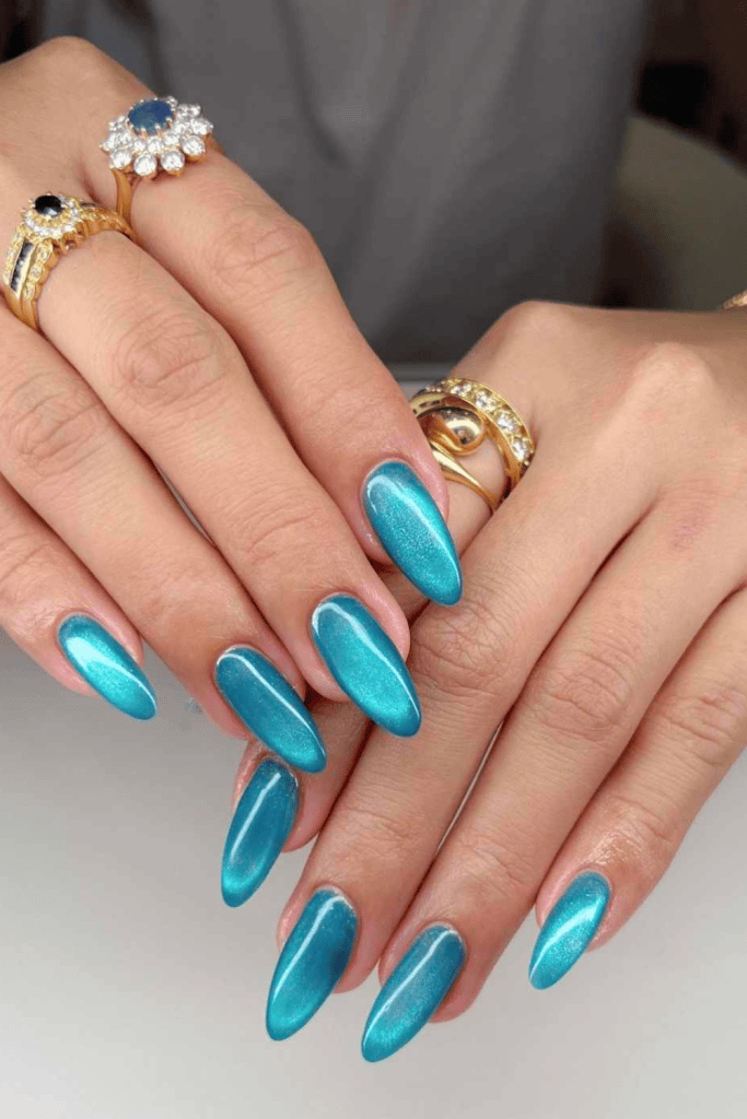 Vibrant Teal Chrome Cat-Eye Nails Vibrant Teal Chrome Cat-Eye Nails β Winter Acrylic Nails