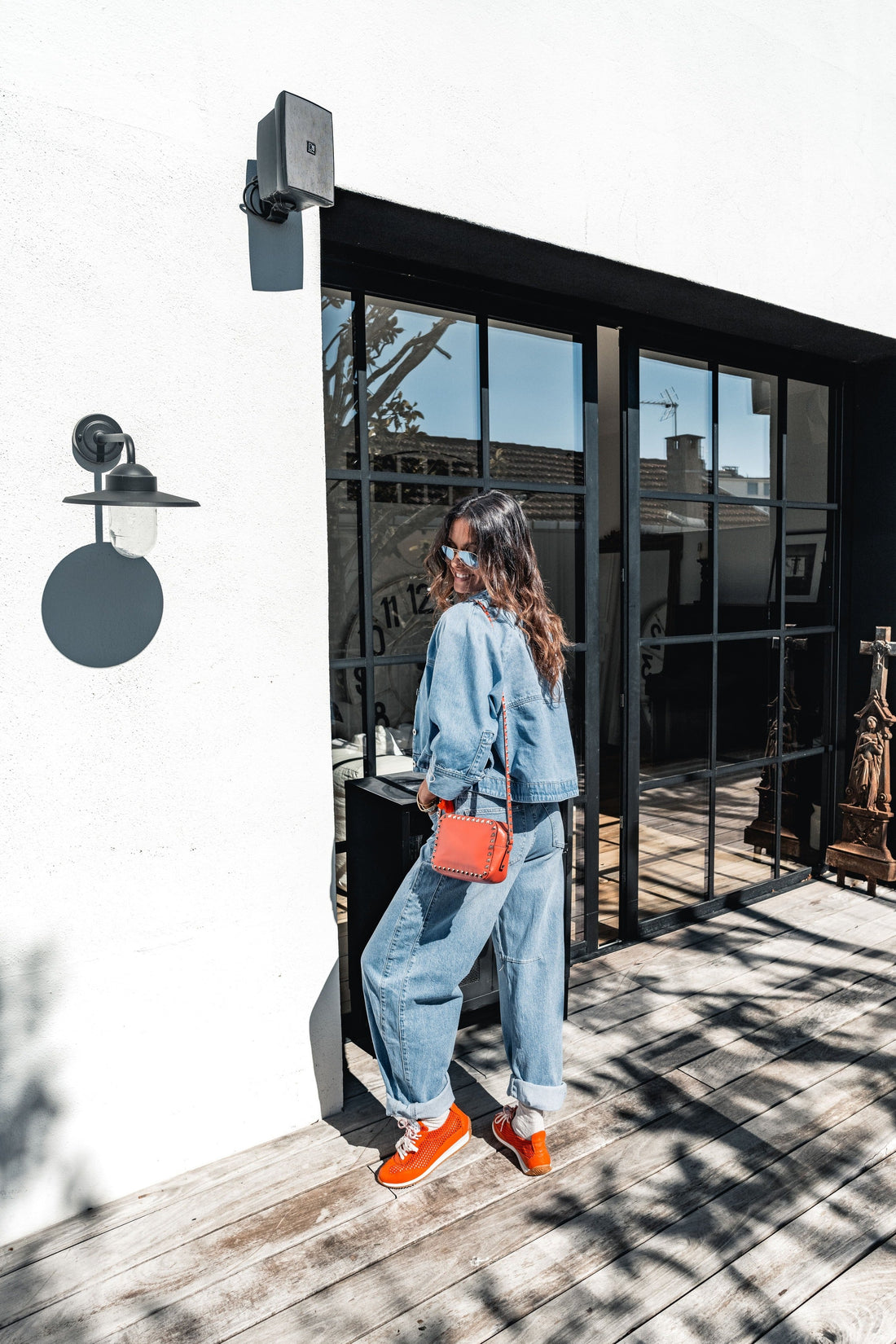 Denim Jacket and Jeans with Bright Sneakers Denim Jacket and Jeans with Bright Sneakers β Winter to Spring Transition Outfits