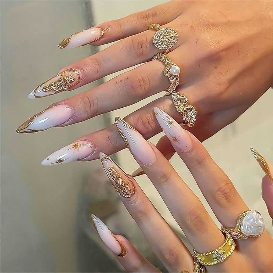Gold Foil Star 3D Embellished Stiletto Nails Gold Foil Star 3D Embellished Stiletto Nails β New Years Nail Designs 2027
