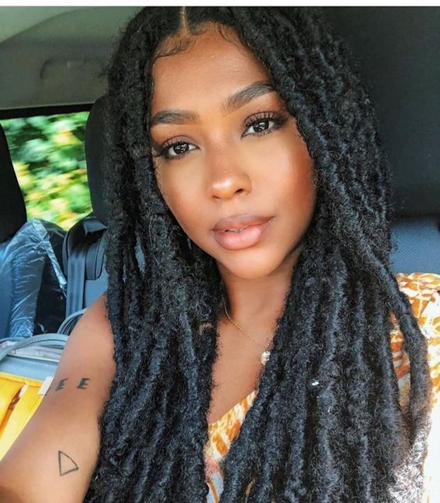 Deep Black Faux Locs — Winter Hairstyles for Long Hair