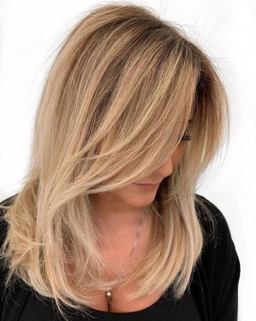 Medium Blonde Blowout With Face-Framing Layers — Reverse Balayage