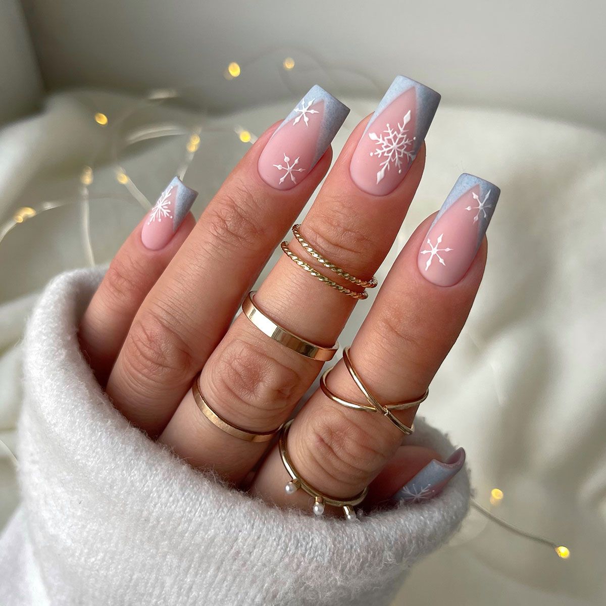 Matte Pink French With Light Blue Snowflakes Matte Pink French With Light Blue Snowflakes β Snowflake Nails