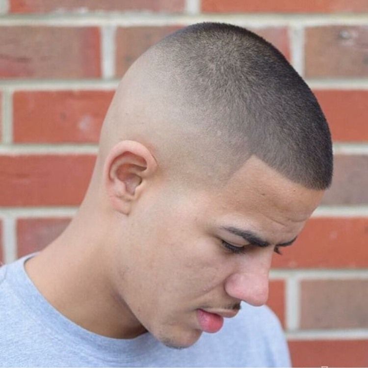 Sleek Undercut with High Top Knot Sleek Undercut with High Top Knot β Winter Hairstyles for Men
