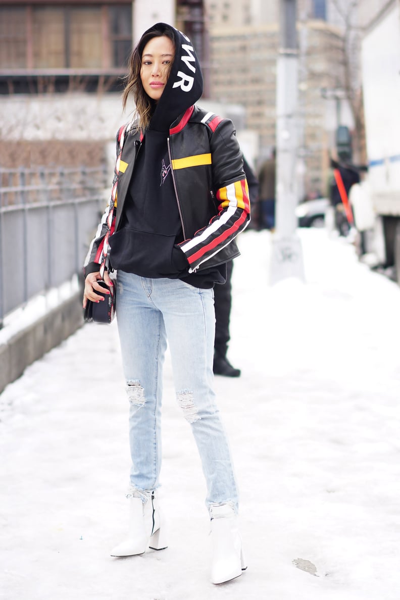 Moto Jacket with Striped Sleeves for Edgy Travel — Winter Travel Outfits