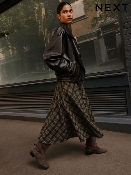 Plaid Midi Skirt with Leather Jacket and Suede Boots — Winter Skirt Outfits