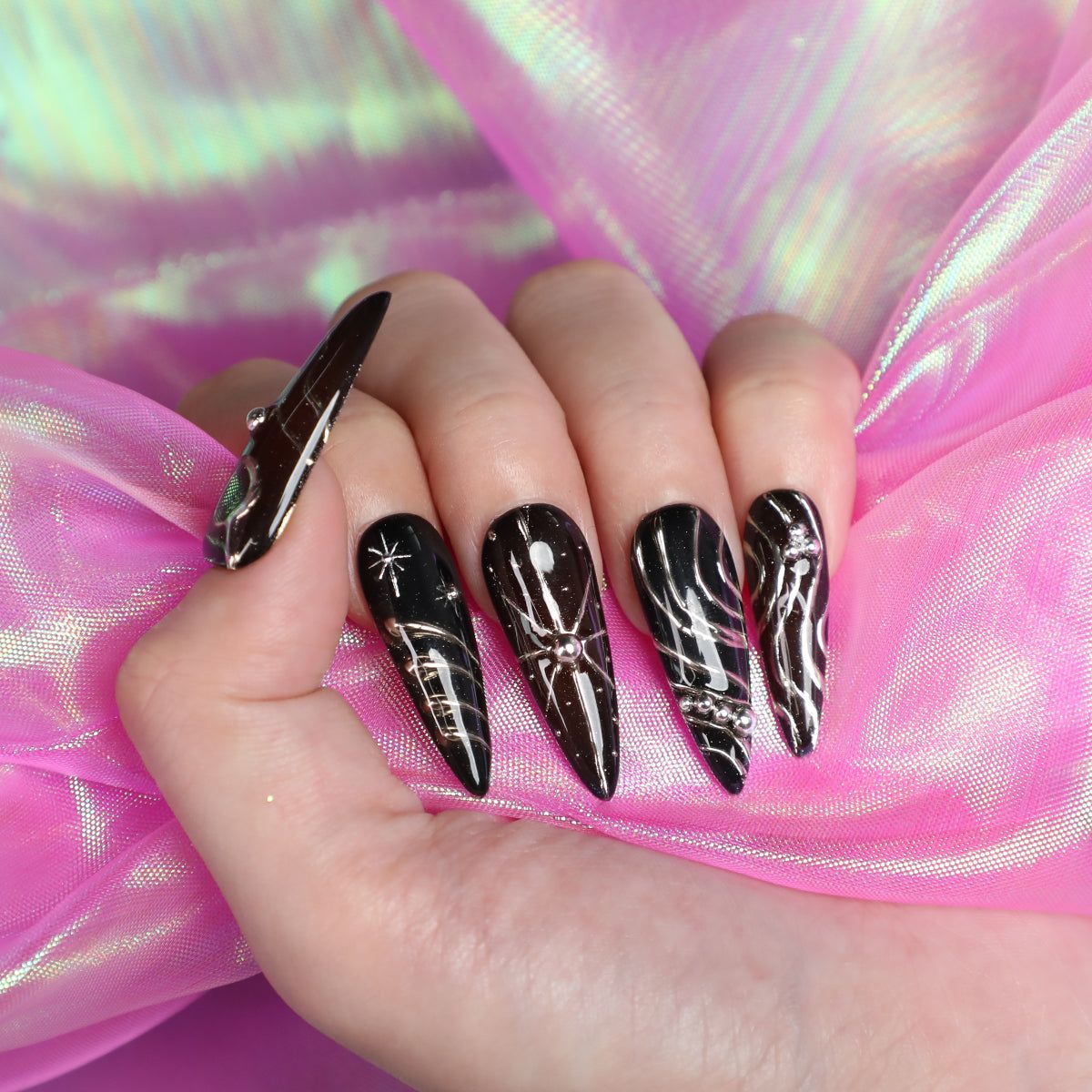 Celestial Black Stilettos With Holographic Shimmer Celestial Black Stilettos With Holographic Shimmer β Winter Stiletto Nails