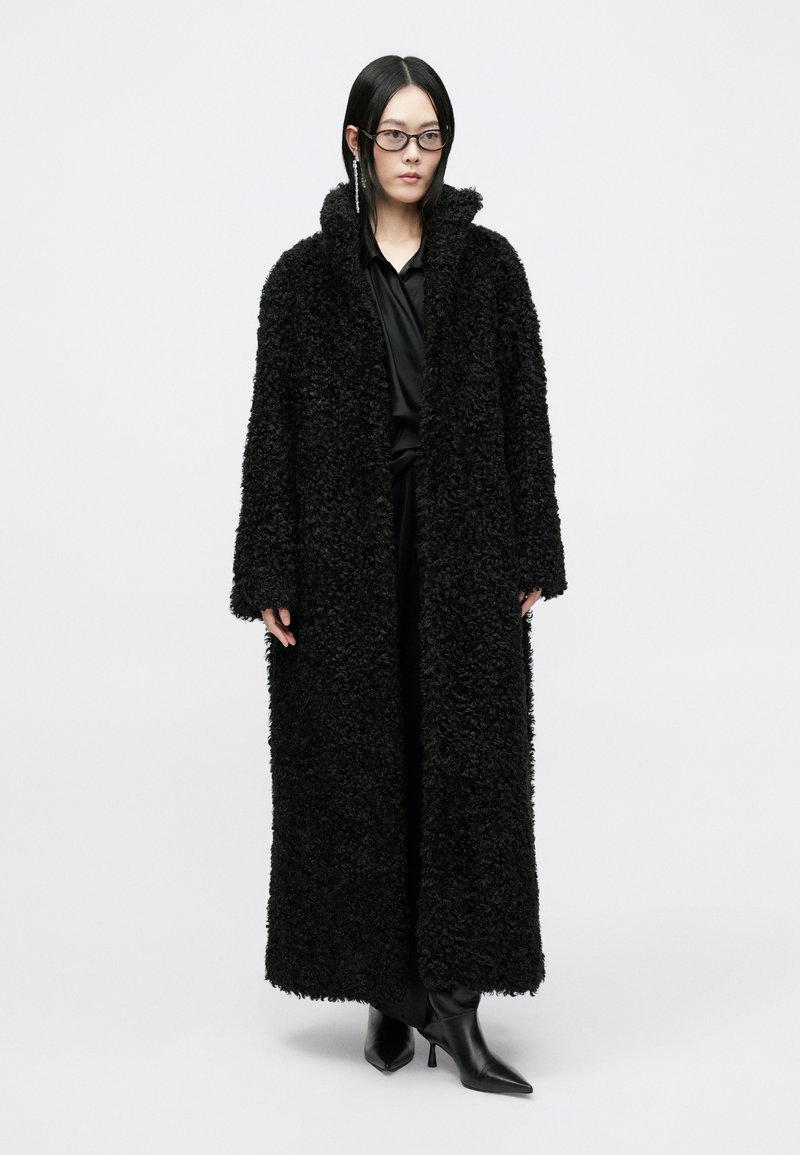 Heavy Textured Black Coat Over Satin for Evening Heavy Textured Black Coat Over Satin for Evening β Black Coat Outfits