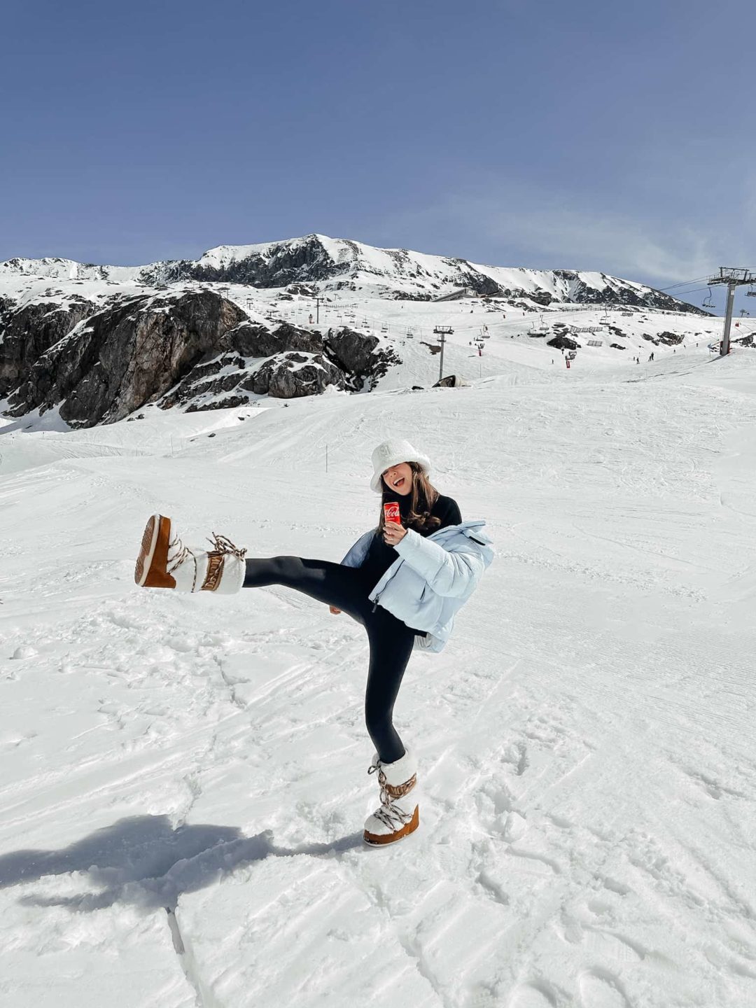 Winter Sports Ready: Tan Moon Boots with Puffer Jacket — Moon Boots Outfits