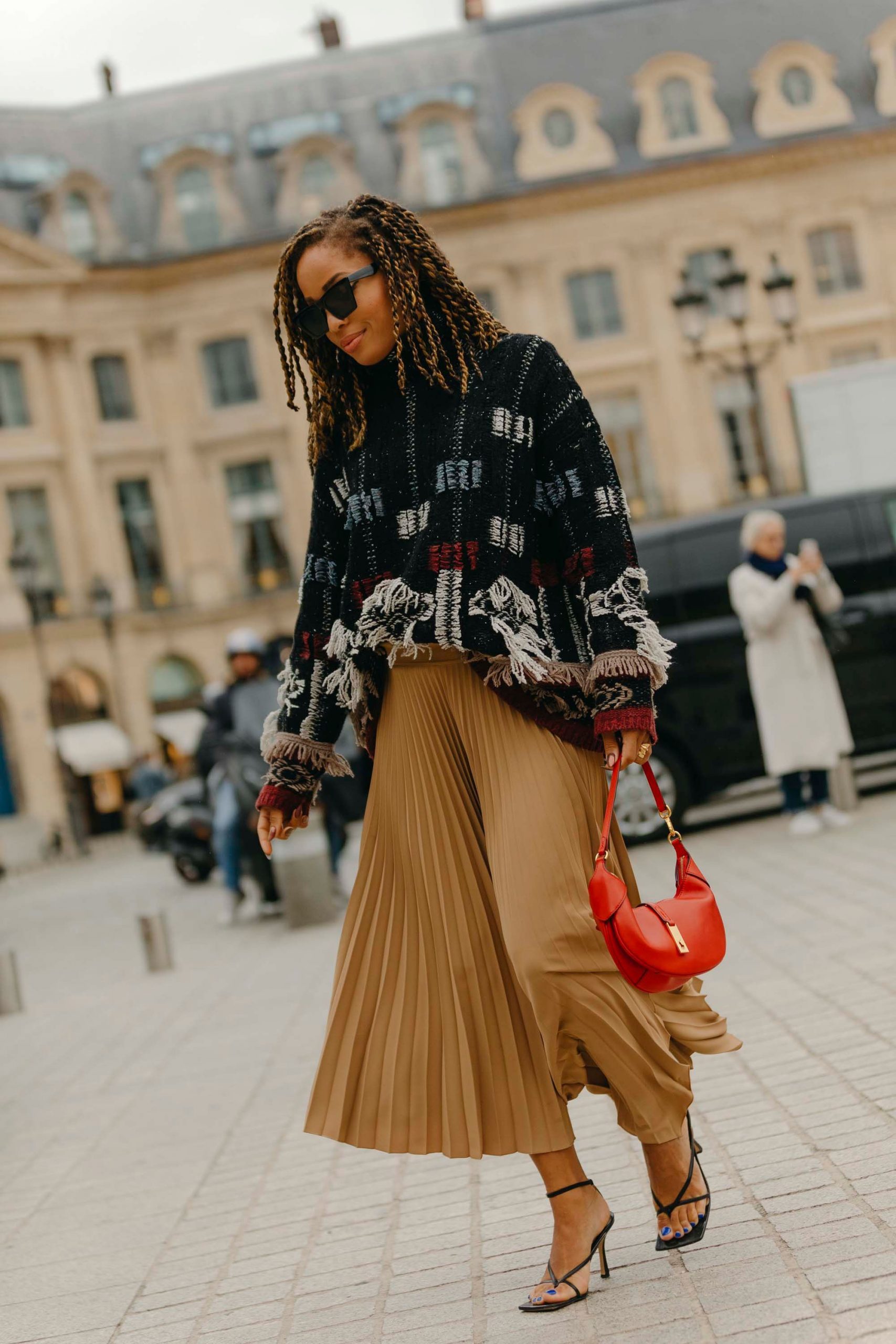 Boho Flair: Patterned Fringe Sweater with Pleated Midi Skirt — Oversized Sweater Outfits