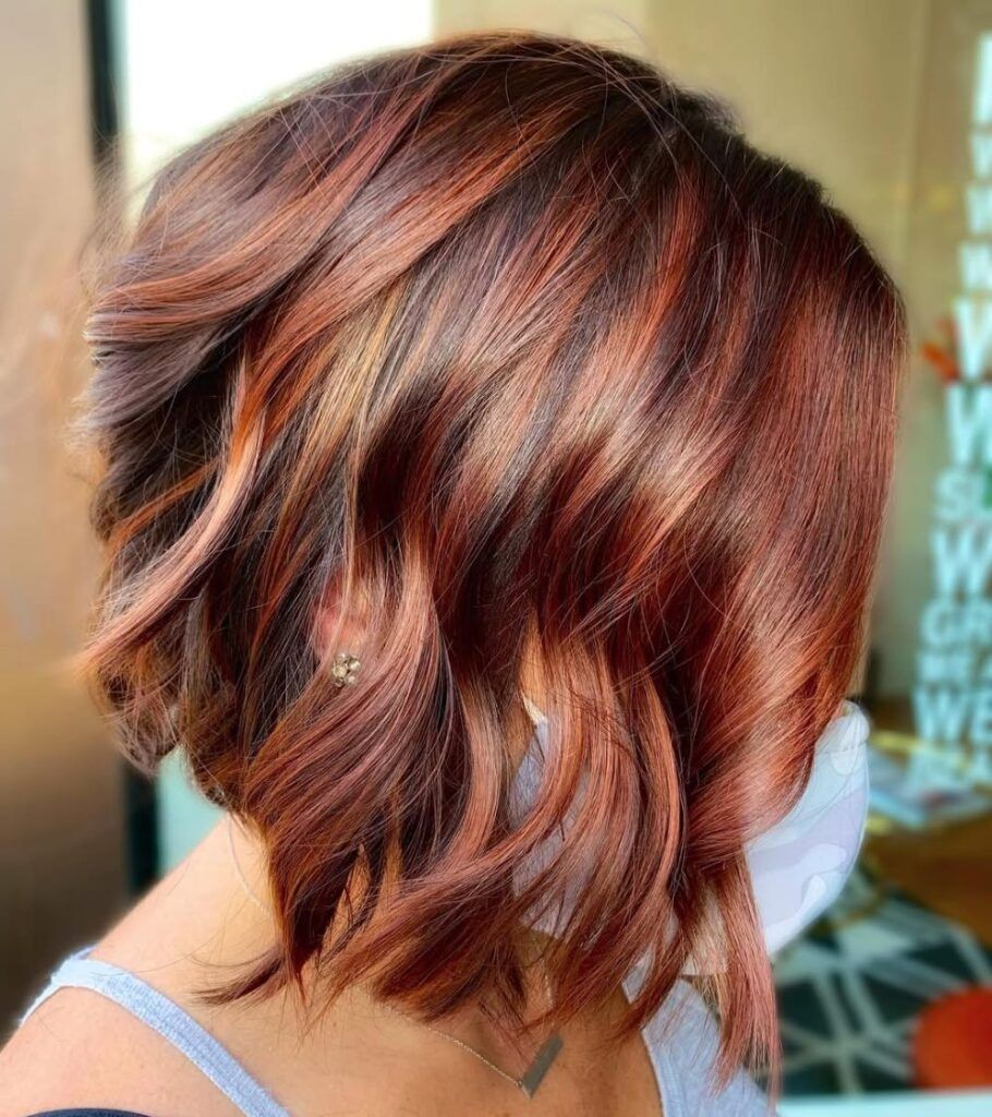 Rich Auburn Angled Bob With Subtle Highlights — Winter Auburn Hair Color