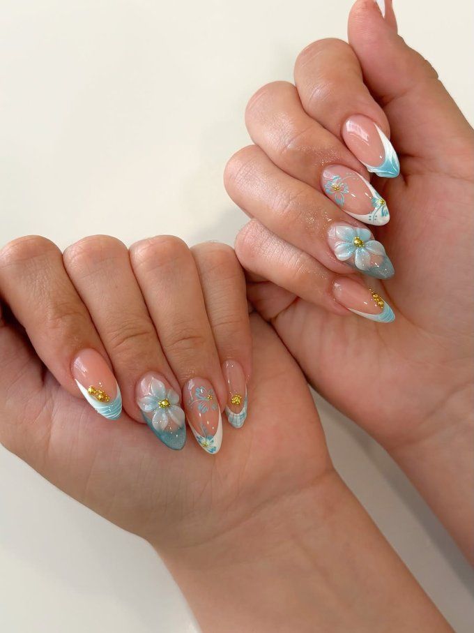 3D Blue Floral Swirl Long Almond Nails 3D Blue Floral Swirl Long Almond Nails β Holiday Nails 2026
