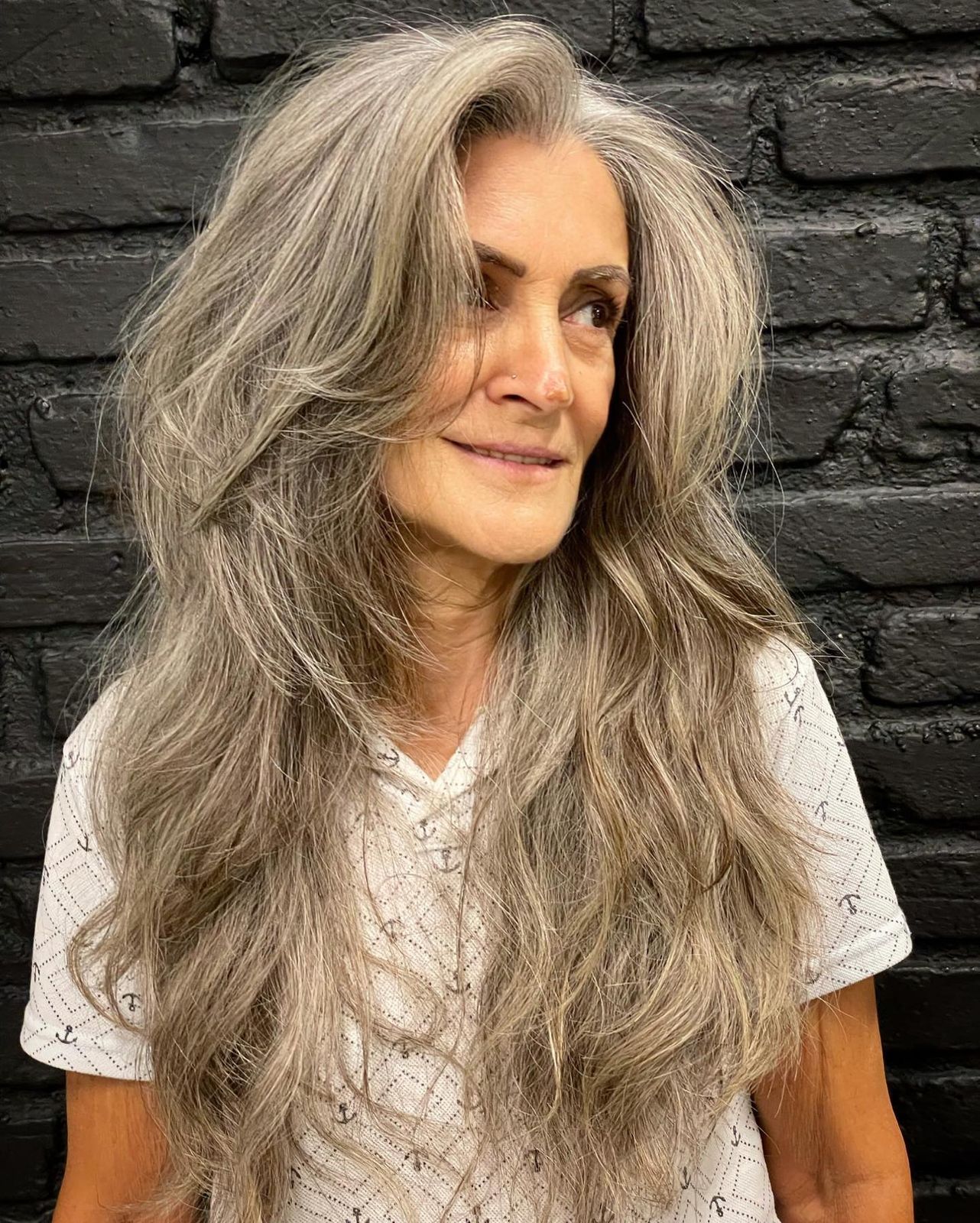 Mid-Back Ash Blonde With Silver Undertones — Winter Hair Colors for Women Over 70