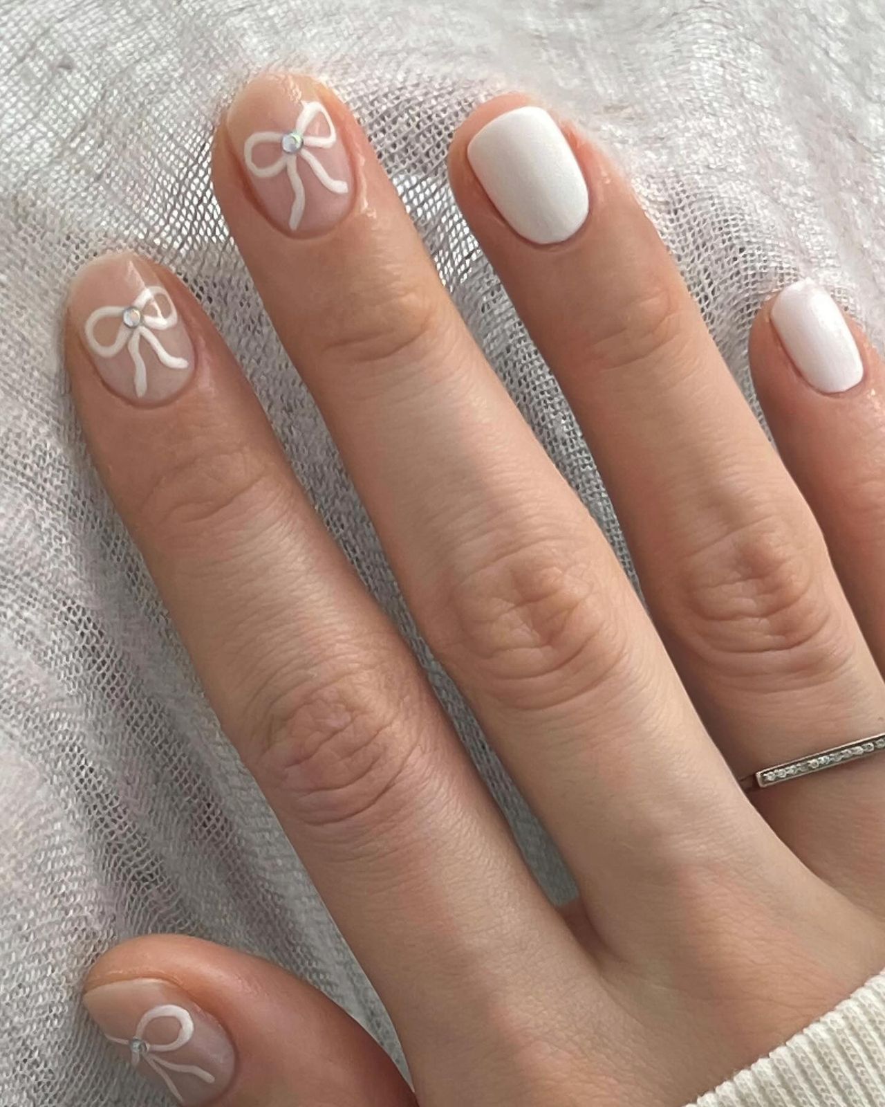 White Bows with Rhinestone Accents White Bows with Rhinestone Accents β Winter Bow Nails