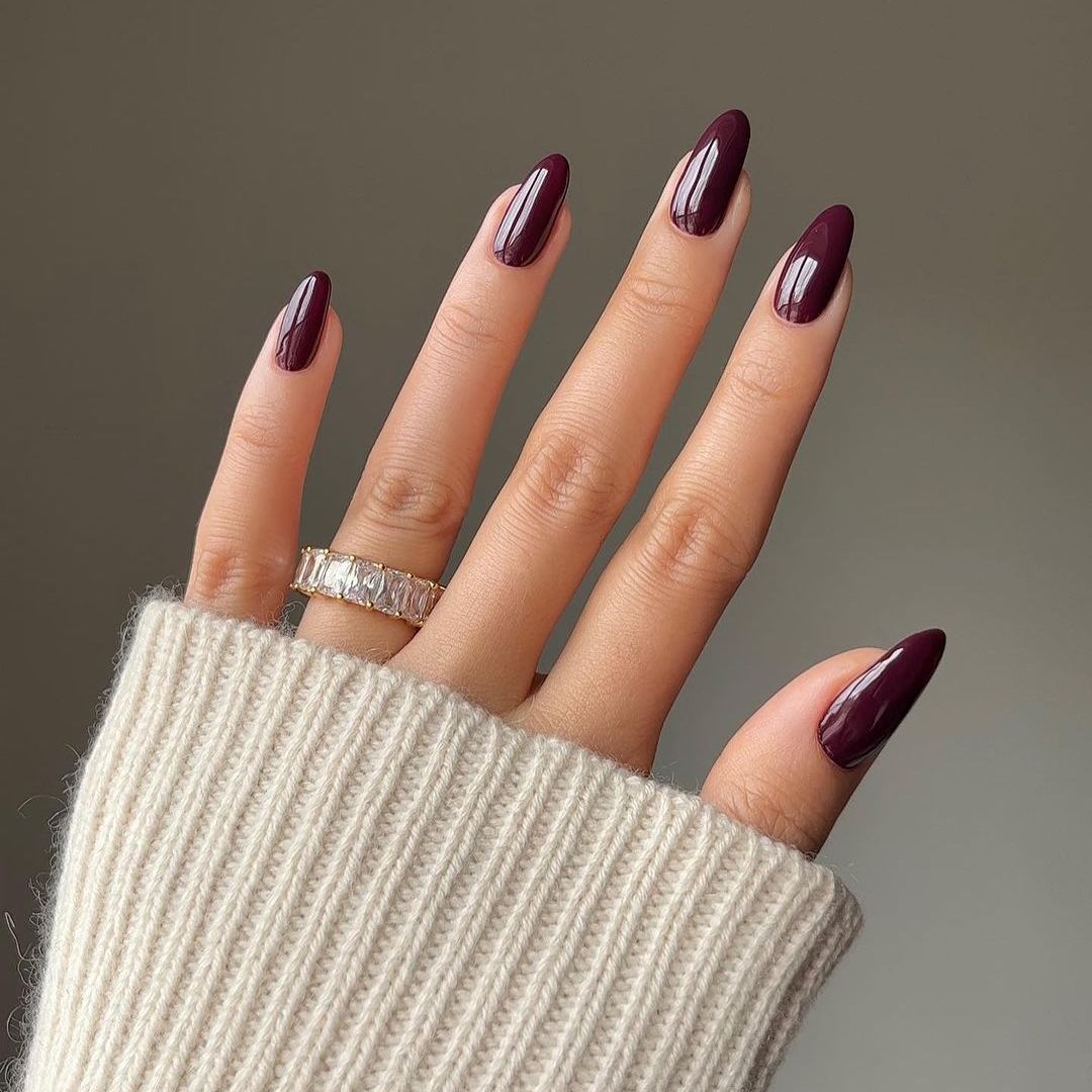 Deep Plum High Gloss Almond Nails Deep Plum High Gloss Almond Nails β Medium Length Winter Nails